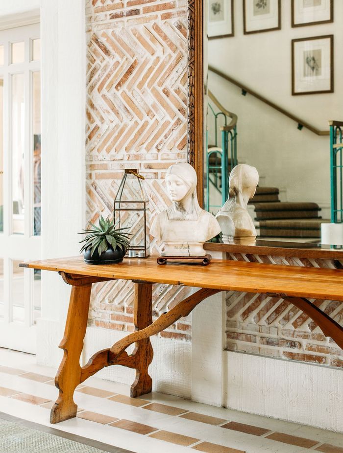 The lodge was built much later than the main farmstead’s 1800s origins but retains the old-world charm. “We've created thoughtful vignettes using antique pieces, furniture and art to provide visual moments of pause throughout,” says Nikki.