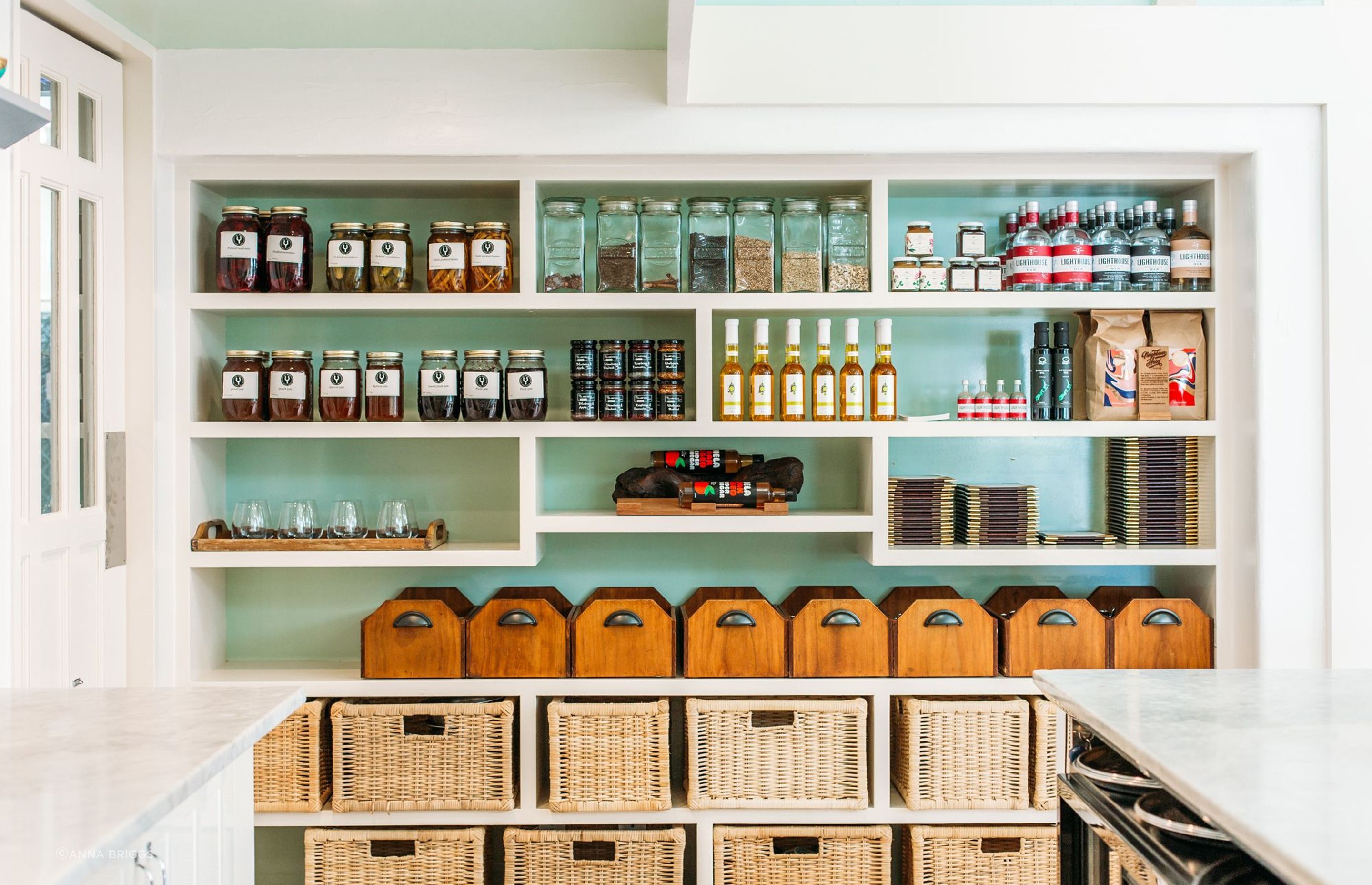 The scullery adjacent to the breakfast room and kitchen. Wharekauhau produces and sells its own honey, marmalade, gin and more.