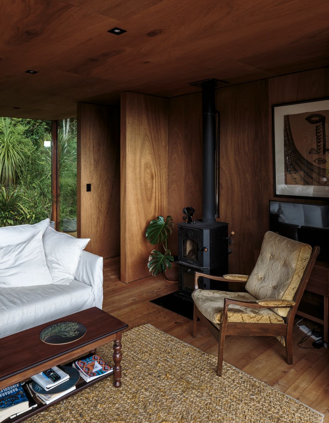 The wetback log fire provides hot water and sustainable heating for the home.