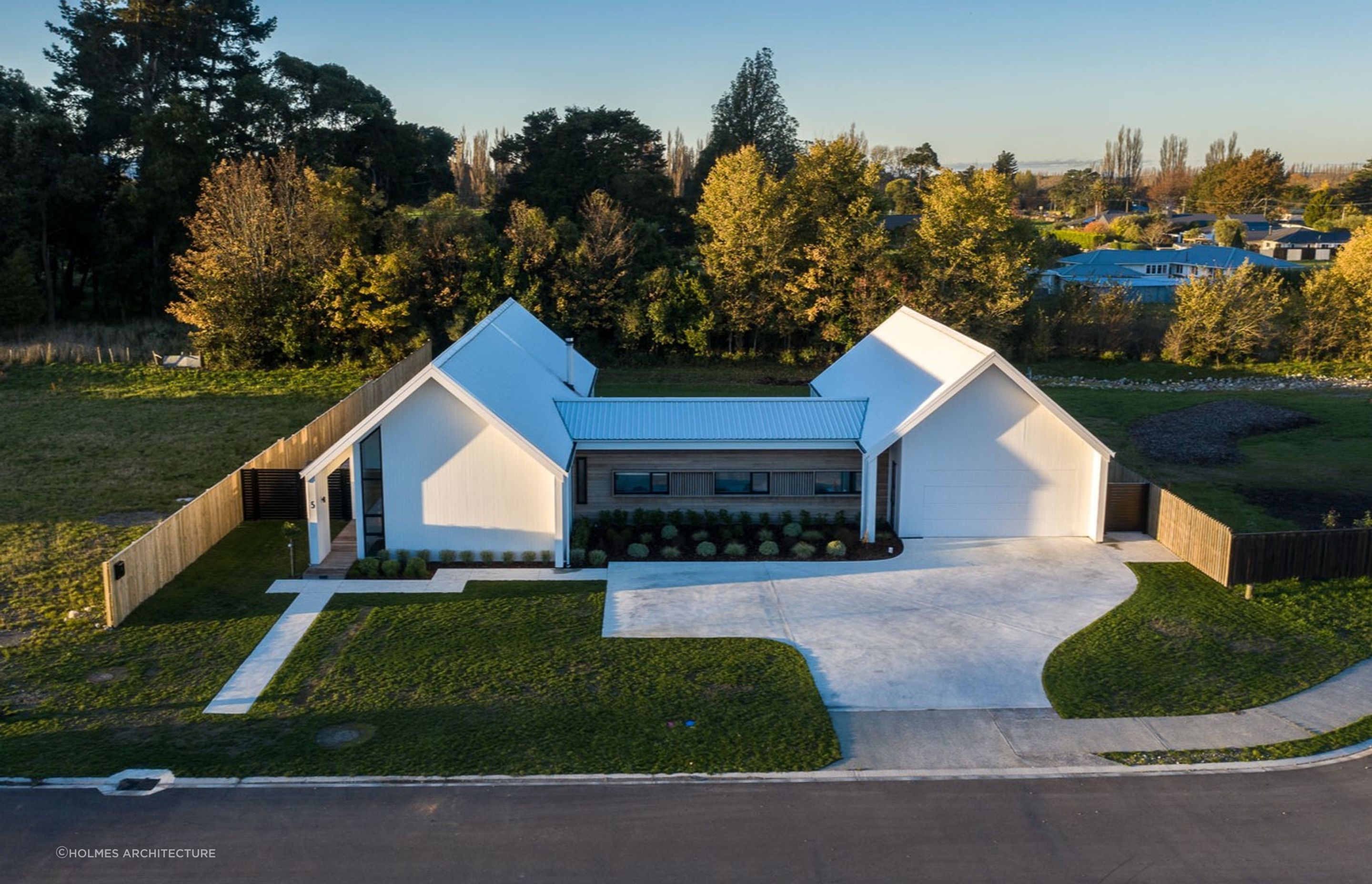 An elevated view of the exquisite Four Gables House by Holmes Architecture. | Photography: André Vroon Photographer