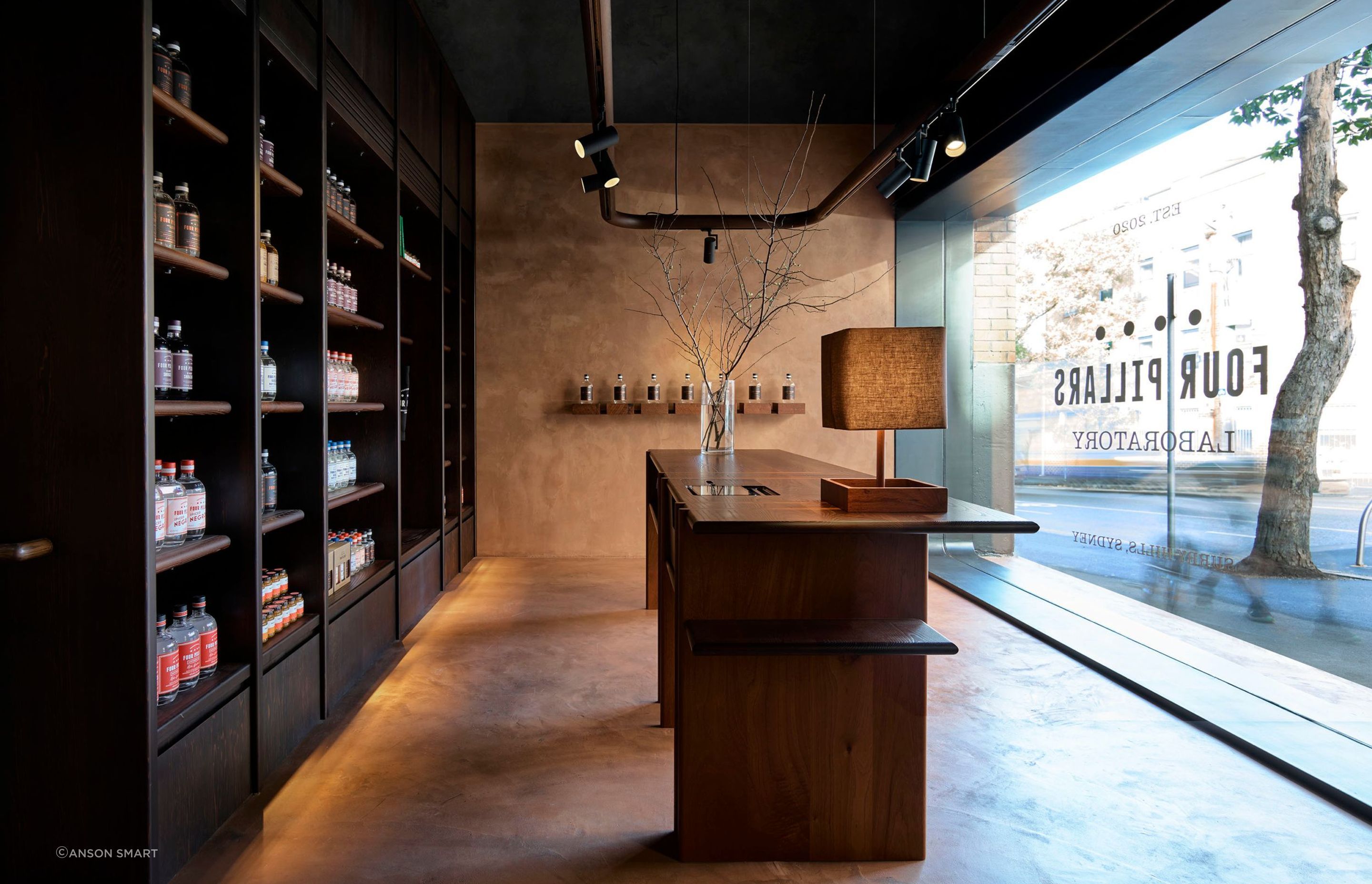 Custom-designed joinery crafted from a blend of Australian hardwoods showcases the Four Pillars' products.