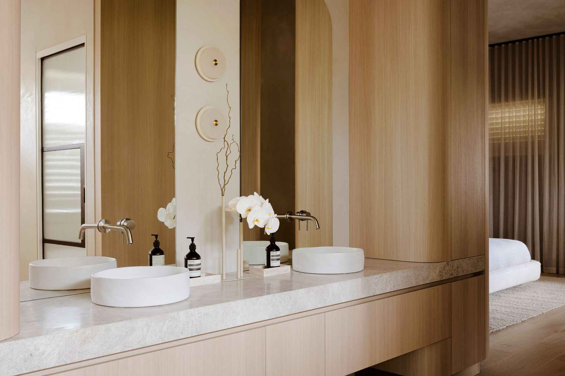 Ammos, Adelaide: Floor-to-ceiling Navurban in The Oaks curves the surfaces of this master suite and ensuite thanks to this creative trio: Architect Hong Henwood, Interior Designer Karen Leech and IJF Living joinery.