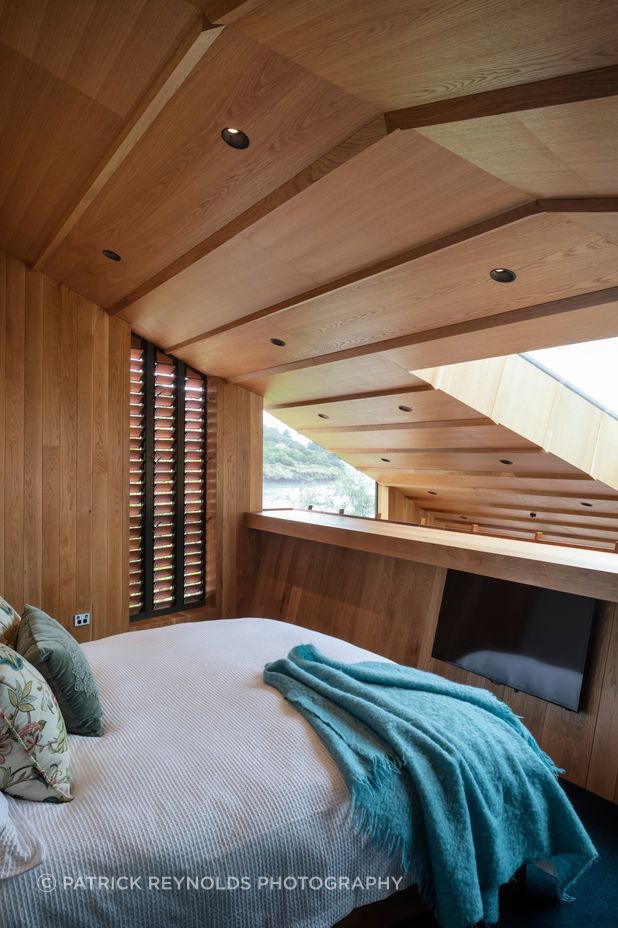 The home has three bedrooms and three and a half bathrooms. Because each bedroom has an en suite the family hadn't decided whose room was whose through the process. “The one on the mezzanine above the kitchen is now the main bedroom,” says Brad.