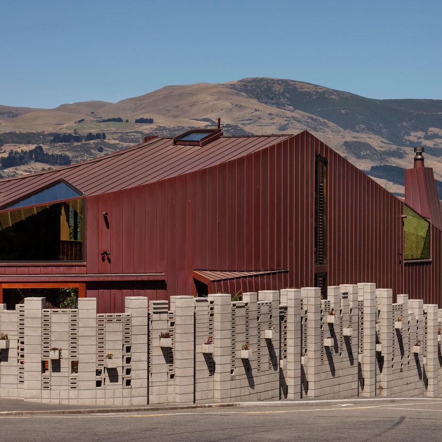 Big ideas in copper and curves for a beachfront family home