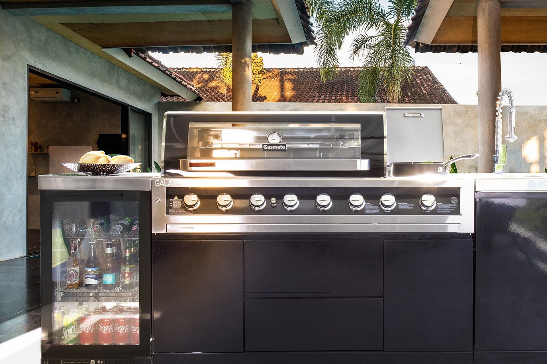 An outdoor fridge like the one featured with the Gasmate Galaxy Black Outdoor Kitchen Package well help keep your drinks chilled on a hot summer's day