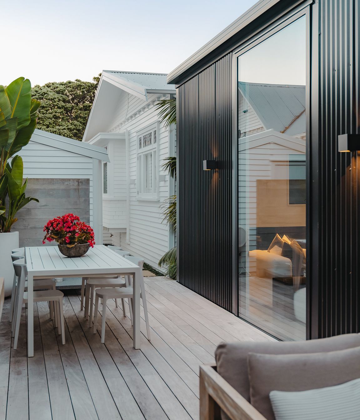 There is a pleasant synchronicity between the original character bungalow and the sharp, contemporary extension.
