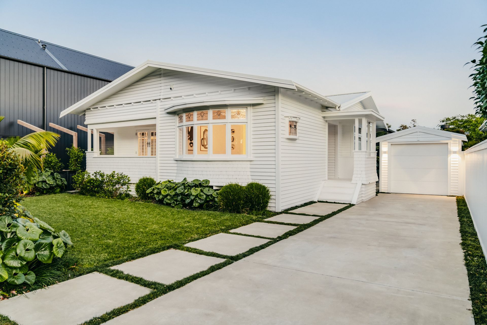 From the road front, the bungalow retains its original facade.