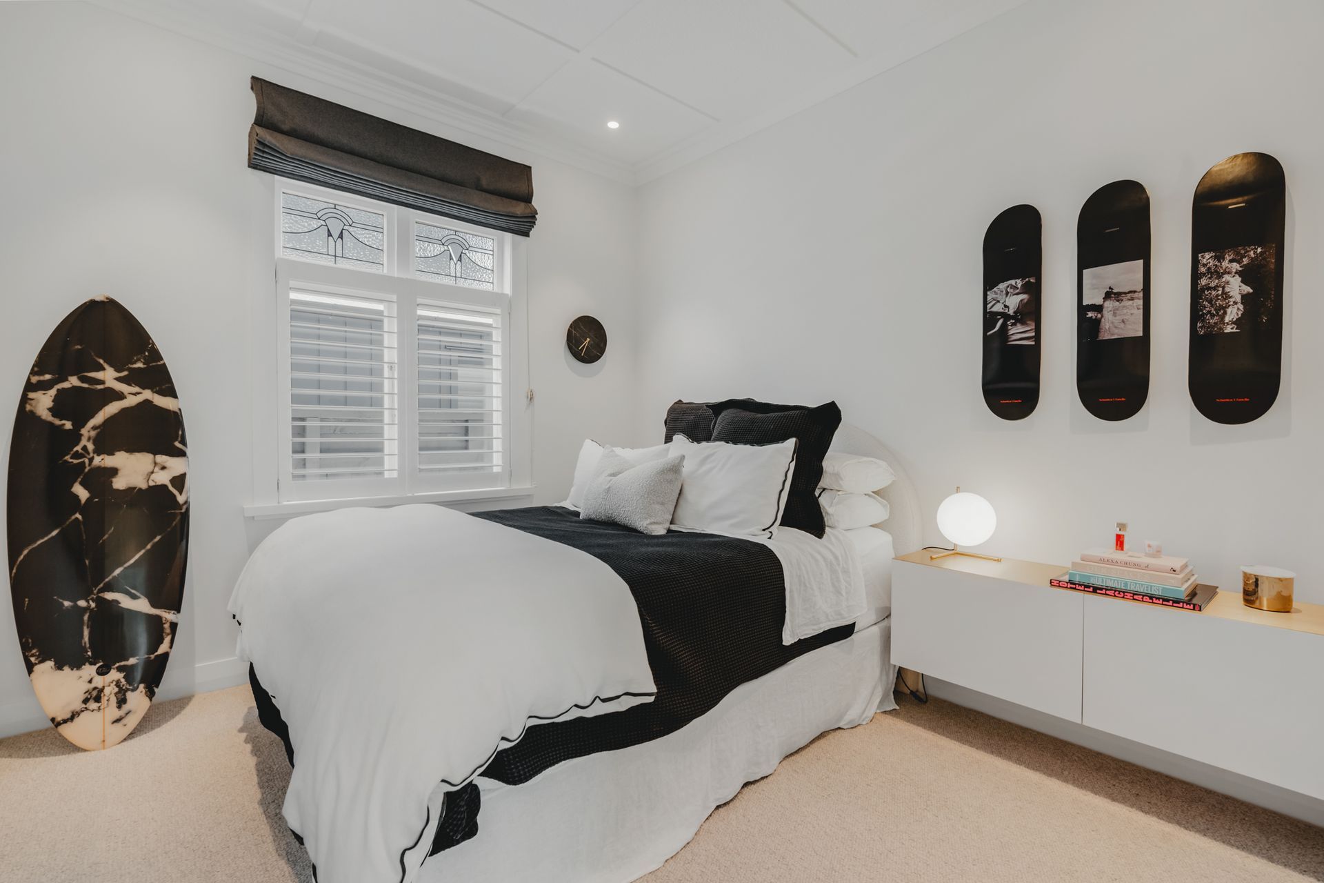 A monochromatic palette is soothing yet high impact in this bedroom.