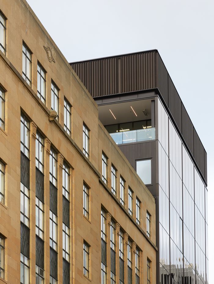 Finer detailing accentuates the building’s proportions. “There’s a 'cap' at the top of the building that’s a series of vertical fins. It was something our client quite liked and is very traditional on an office building,” says Marc.