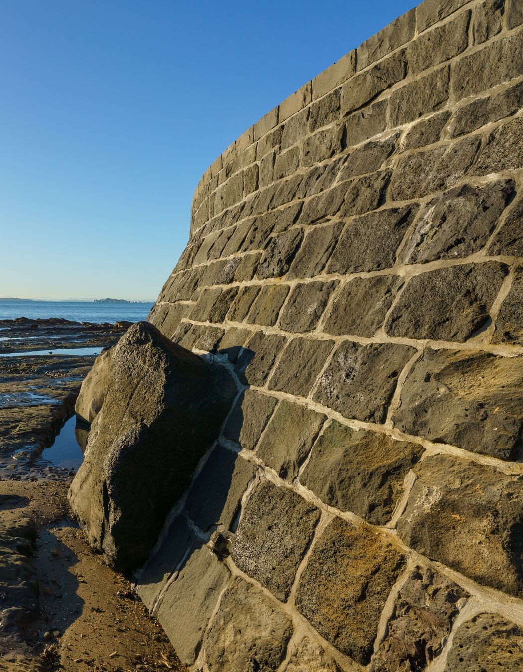 The walls are built using traditional methods, however nowadays, they're grouted the whole way through.
