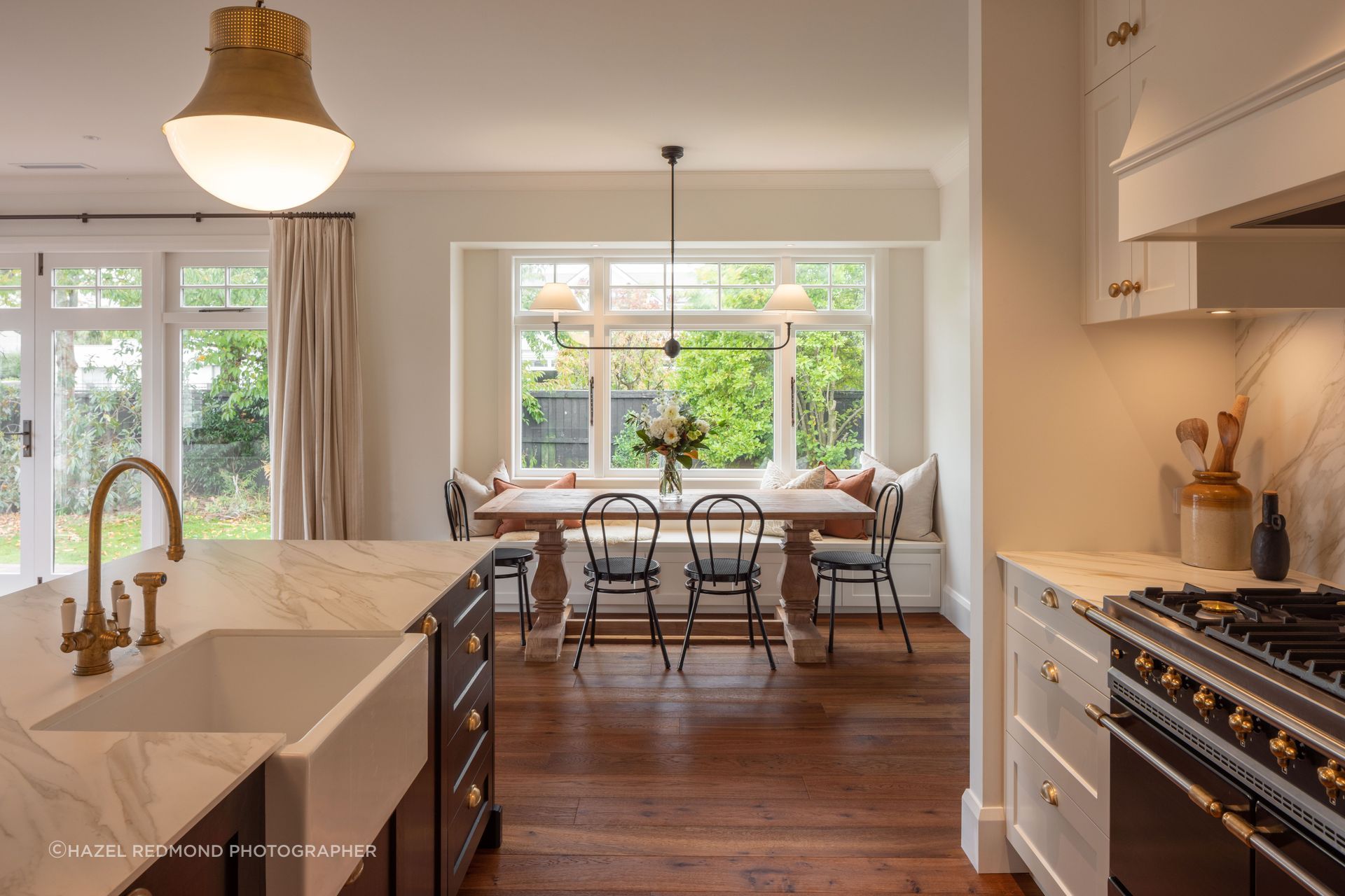 The renovation opened up the kitchen, dining, and living areas to create a bright, modern space fit for a young family.