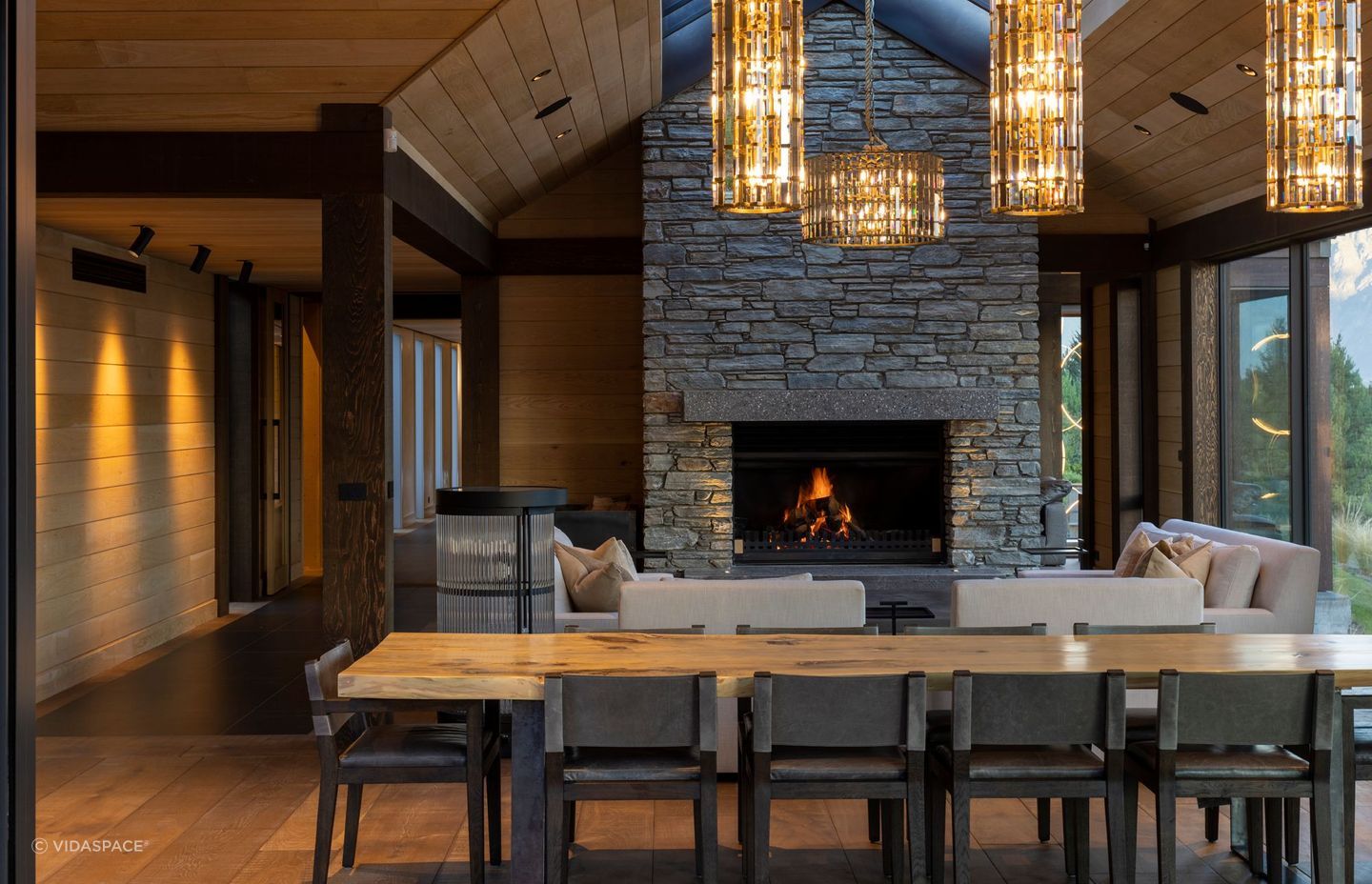 This Lake Wakatipu residence features a beautiful stone wall fireplace. | Photography: Simon Devitt
