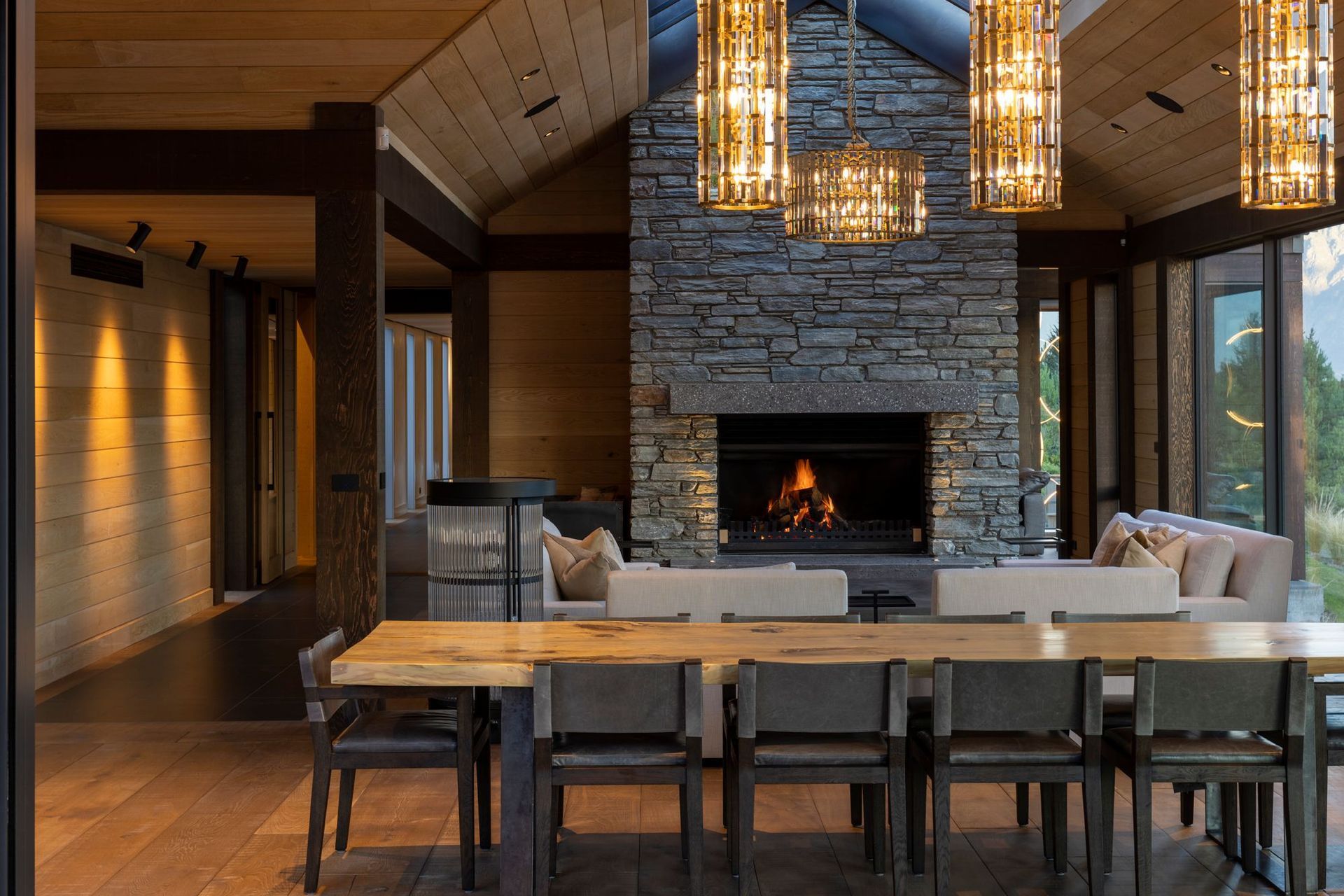 This Lake Wakatipu residence features a beautiful stone wall fireplace. | Photography: Simon Devitt