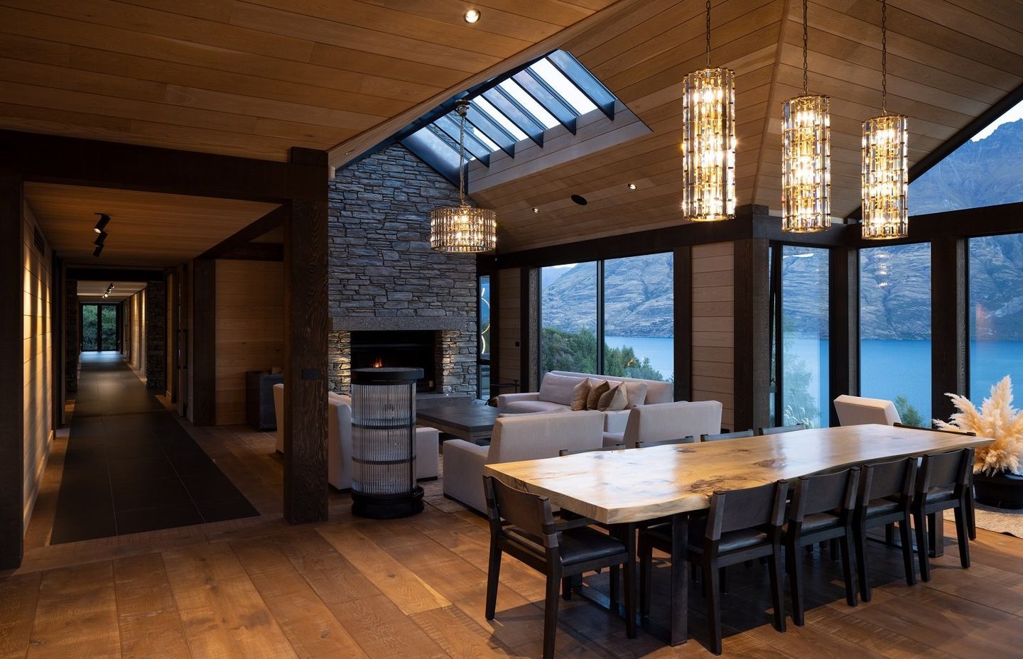 The soaring gable ceilings of the living dining space offer a sense of grandeur.