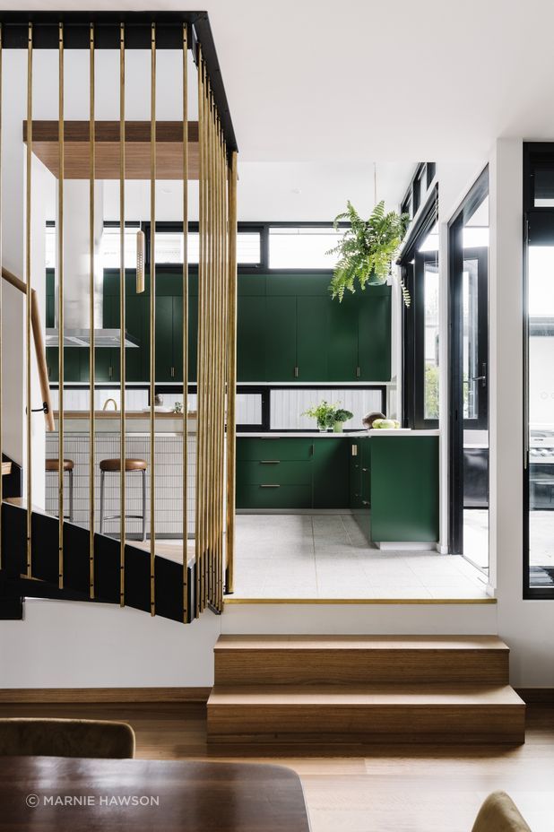 Stepping up from the living and dining, the kitchen floor features beautiful Promenado terrazzo tiles from Beaumont Tiles.