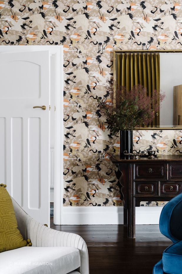 The library’s eye-catching crane wallpaper is an
ode to Andrew’s love of China.