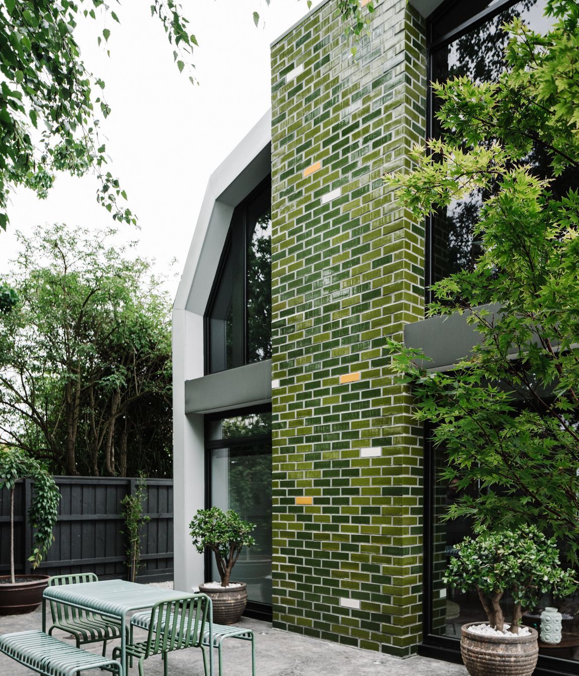 The glazed handmade brick tiles channel the Australian bush.