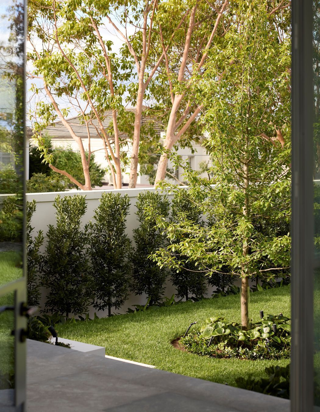 The styling of the home with the Kett range was intended to connect the indoors with Jack Merlo's landscape design.