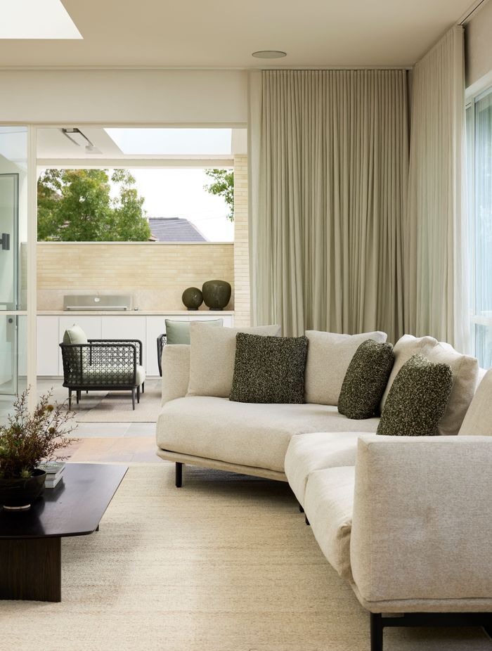 Outdoors, the Aireys woven lounge chairs are featured.