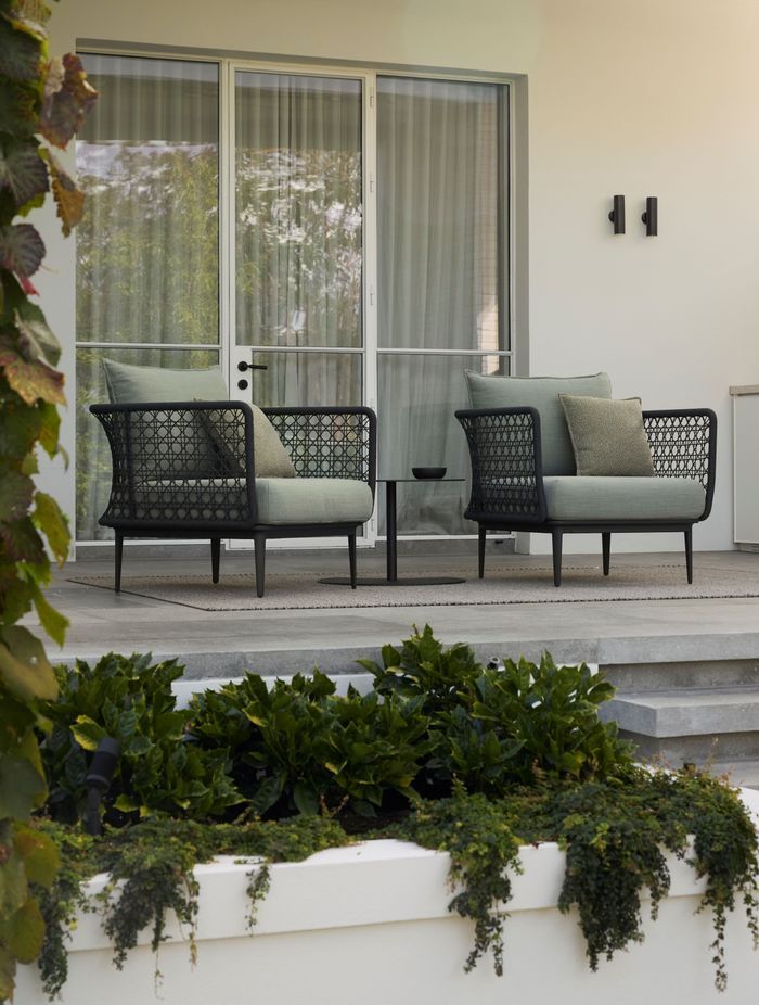 Kett's Aireys outdoor chairs feature woven details on the arms and offer exceptional comfort.