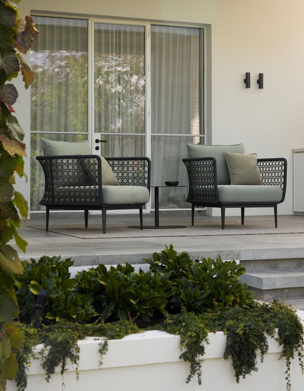 Kett's Aireys outdoor chairs feature woven details on the arms and offer exceptional comfort.