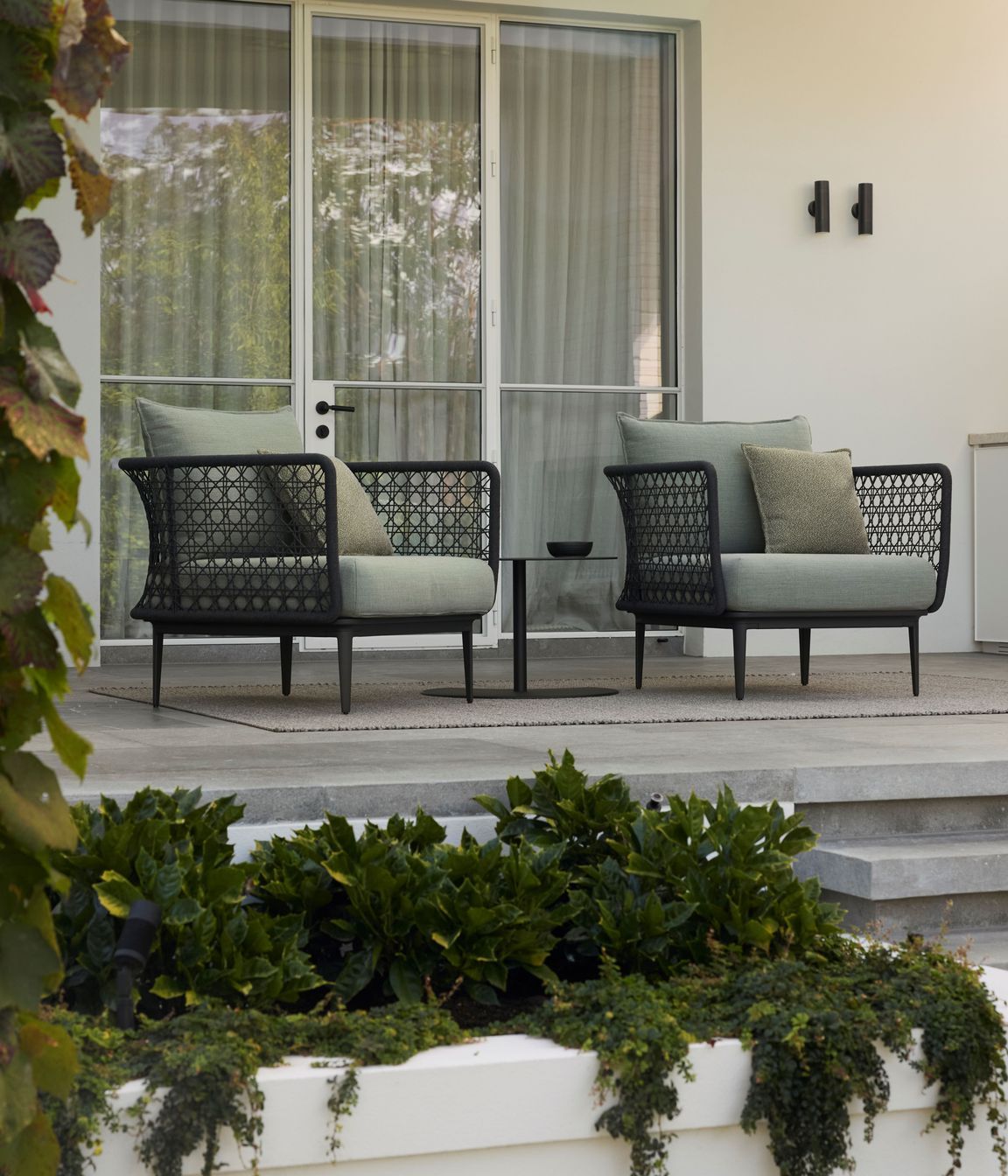 Kett's Aireys outdoor chairs feature woven details on the arms and offer exceptional comfort.