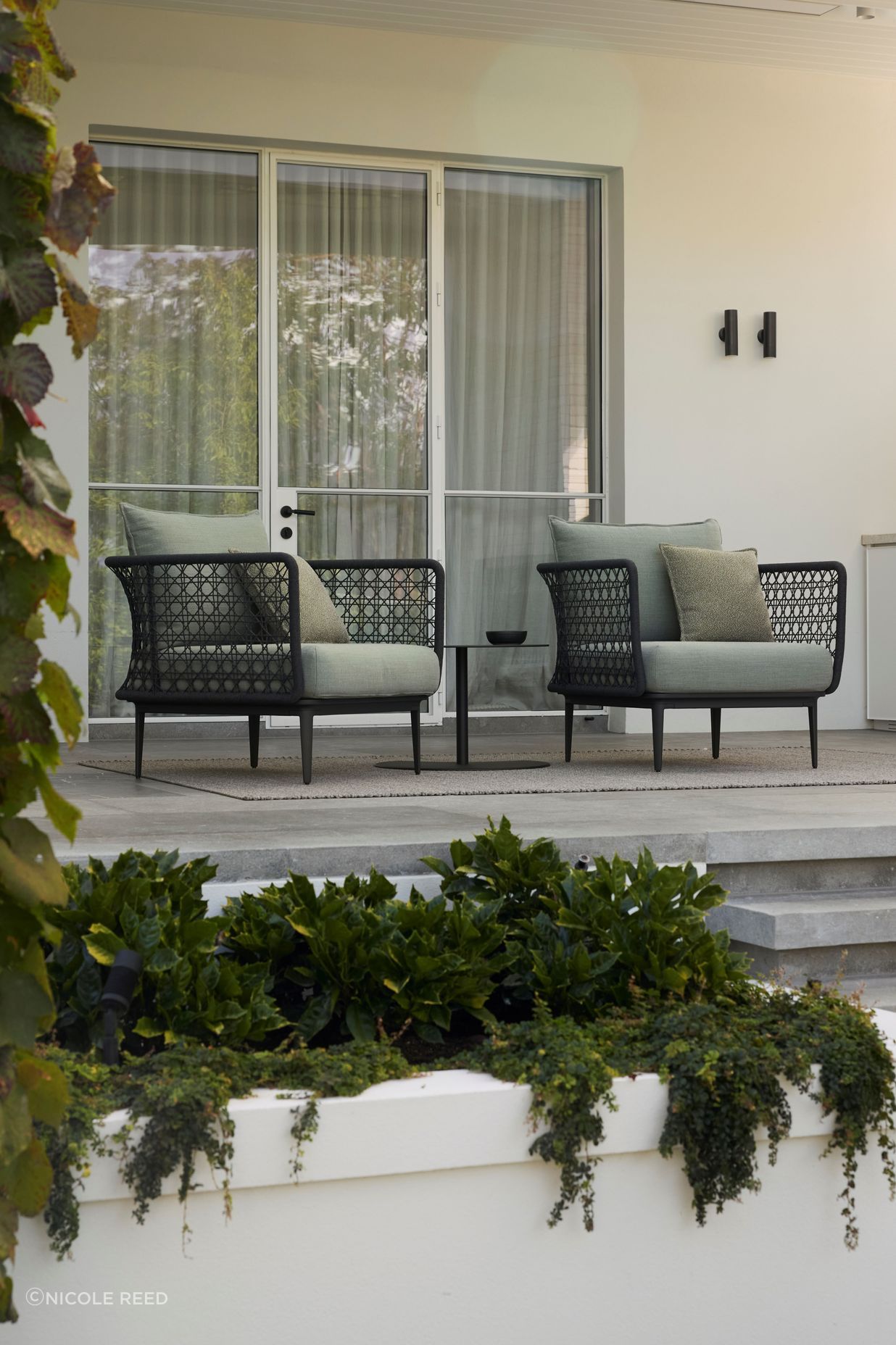 Kett's Aireys outdoor chairs feature woven details on the arms and offer exceptional comfort.