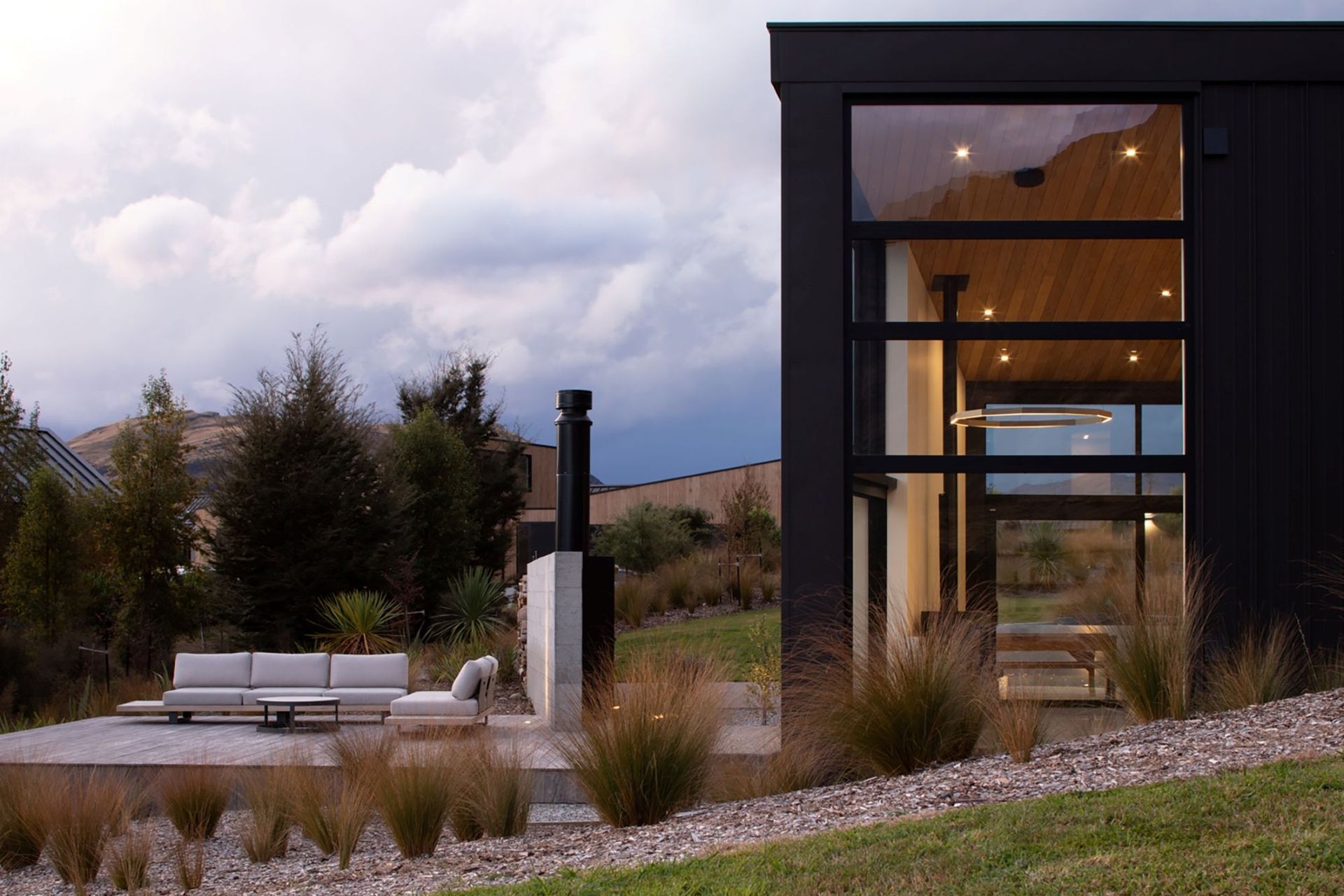 The outdoor terrace is positioned to be sheltered from the prevailing winds. | Photography: David Straight