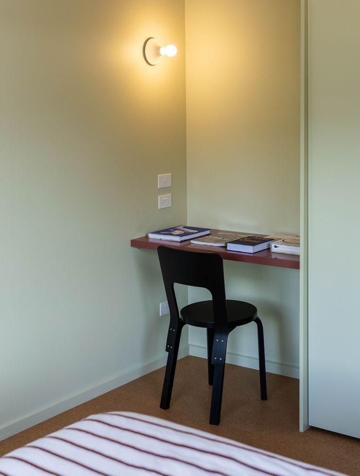 The primary bedrooms in Cabin Originale and Cabin Double feature a built-in desk.