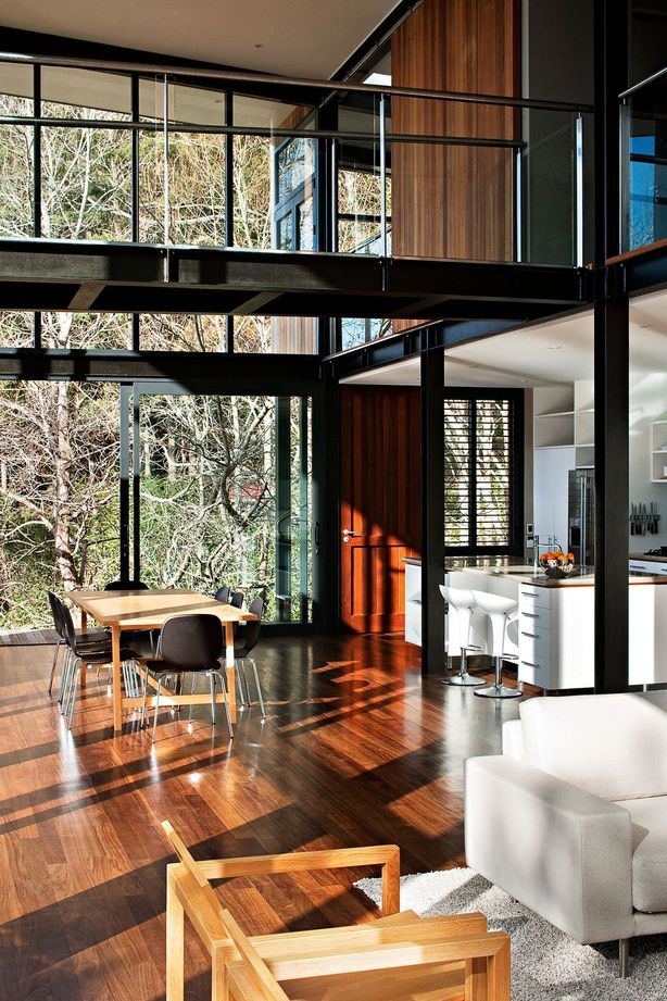 Steel frames and natural timber flooring creates a strong visual contrast.