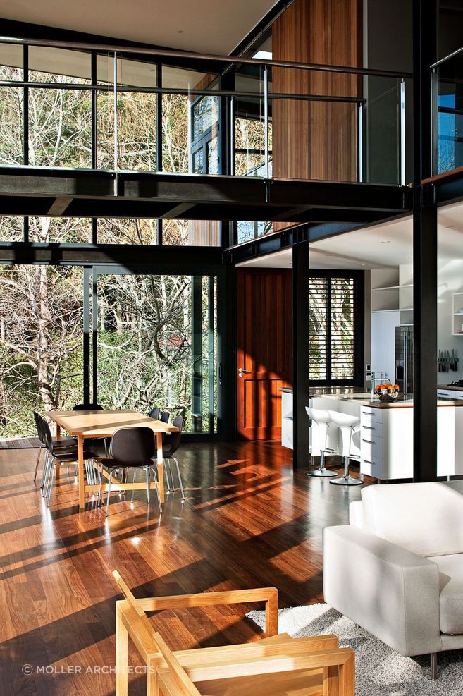 Steel frames and natural timber flooring creates a strong visual contrast.