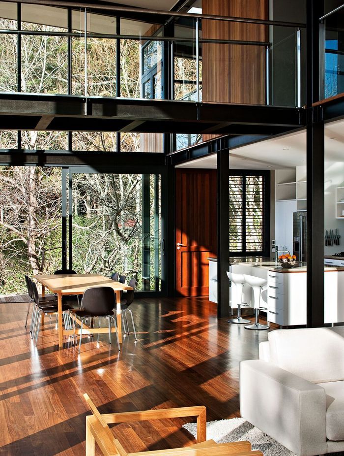 Steel frames and natural timber flooring creates a strong visual contrast.