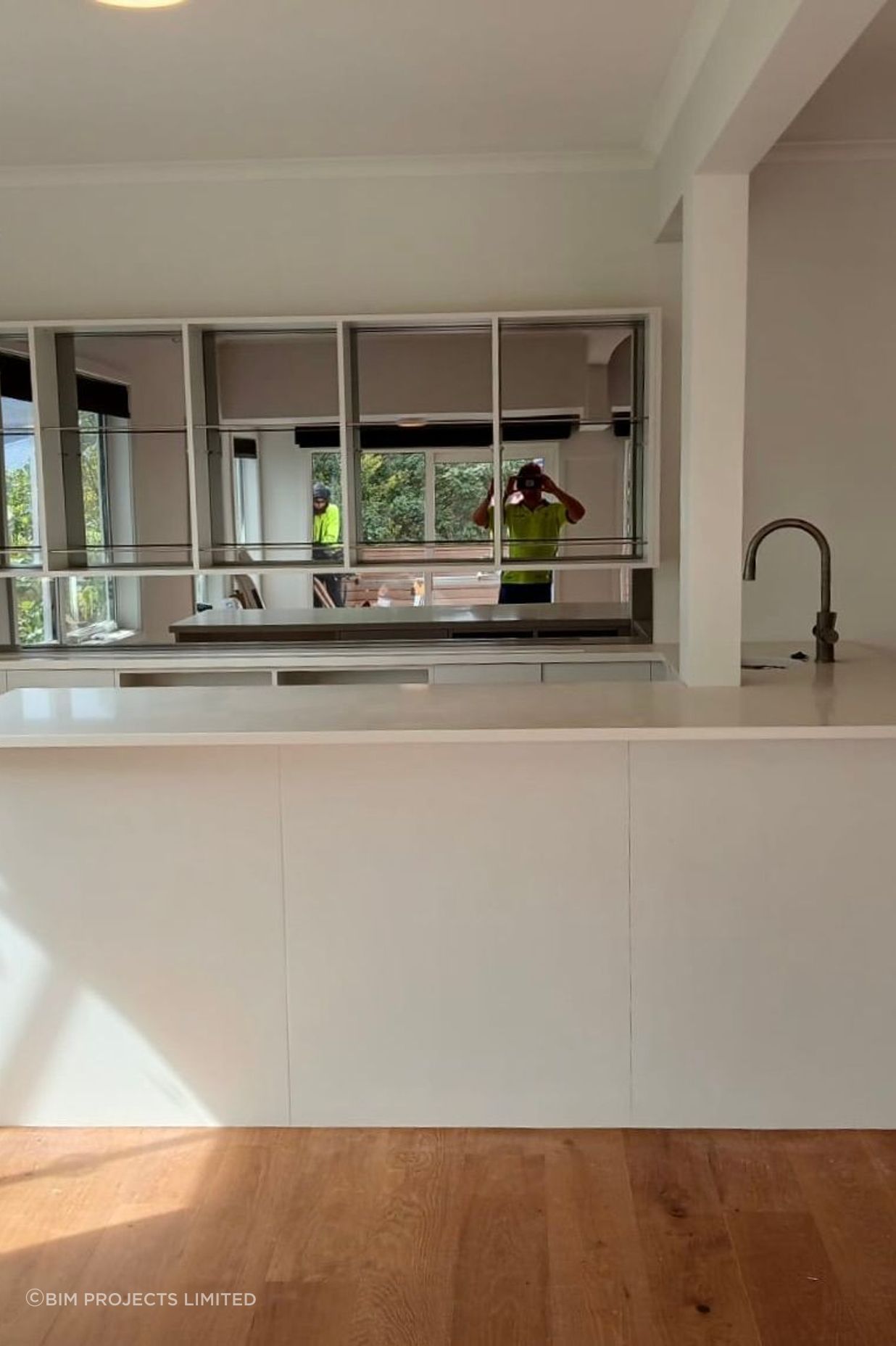 The renovated kitchen is open and full of natural light.