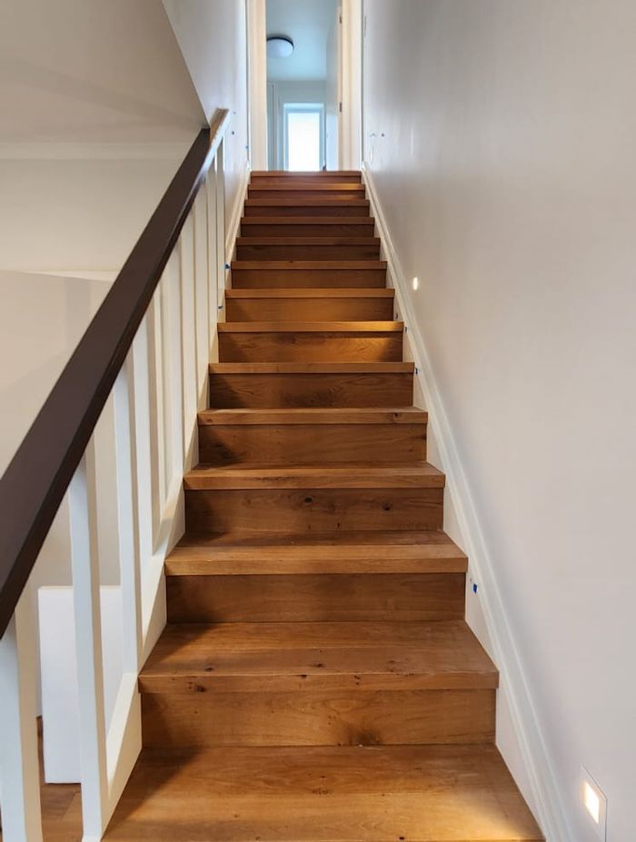 The engineered oak staircase is a standout feature of the home.