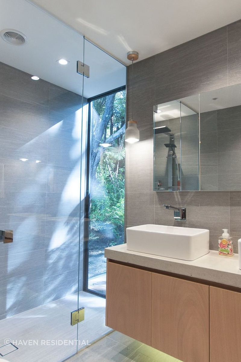 The shower window is a favourite feature for owners Ben and Kylie, and builder Ray.