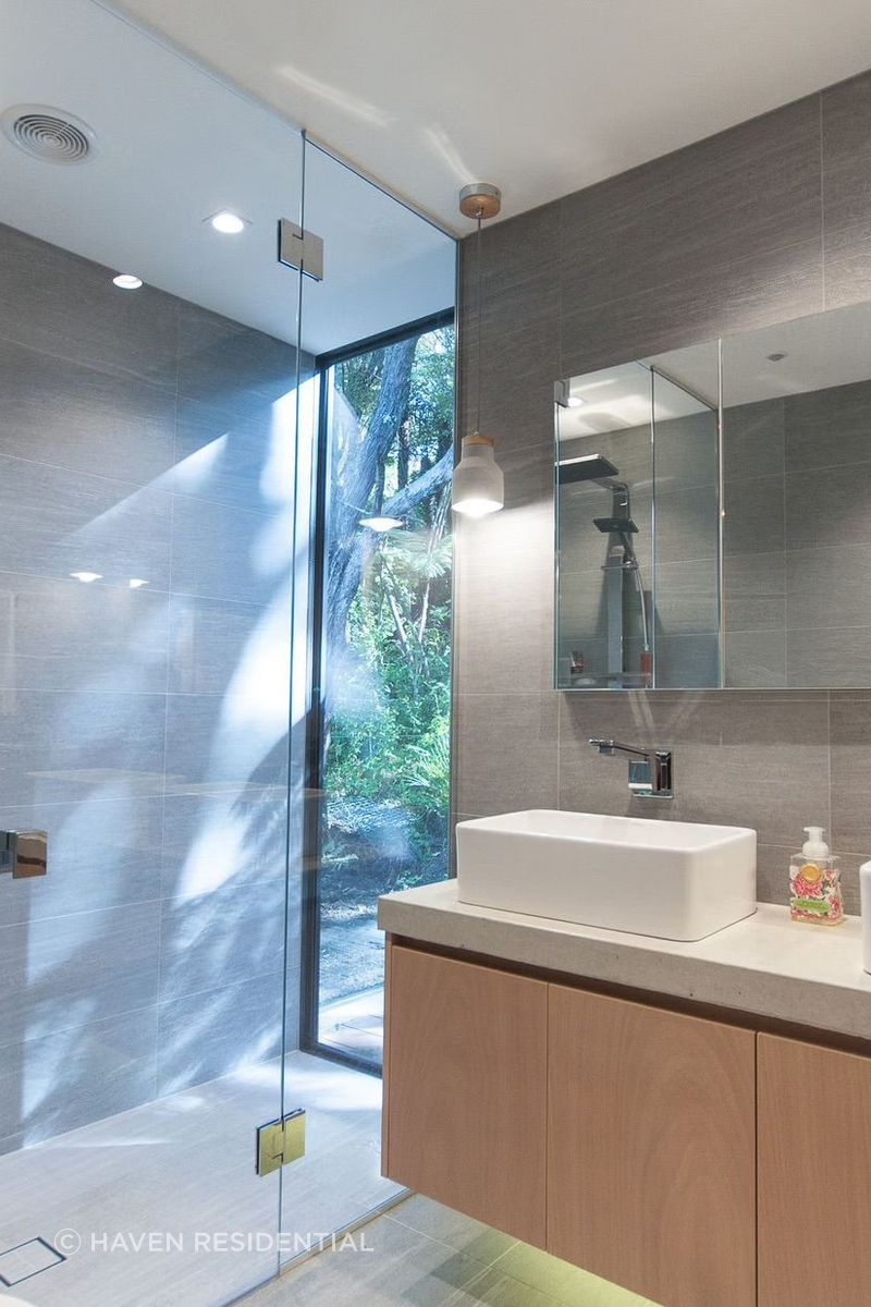 The shower window is a favourite feature for owners Ben and Kylie, and builder Ray.