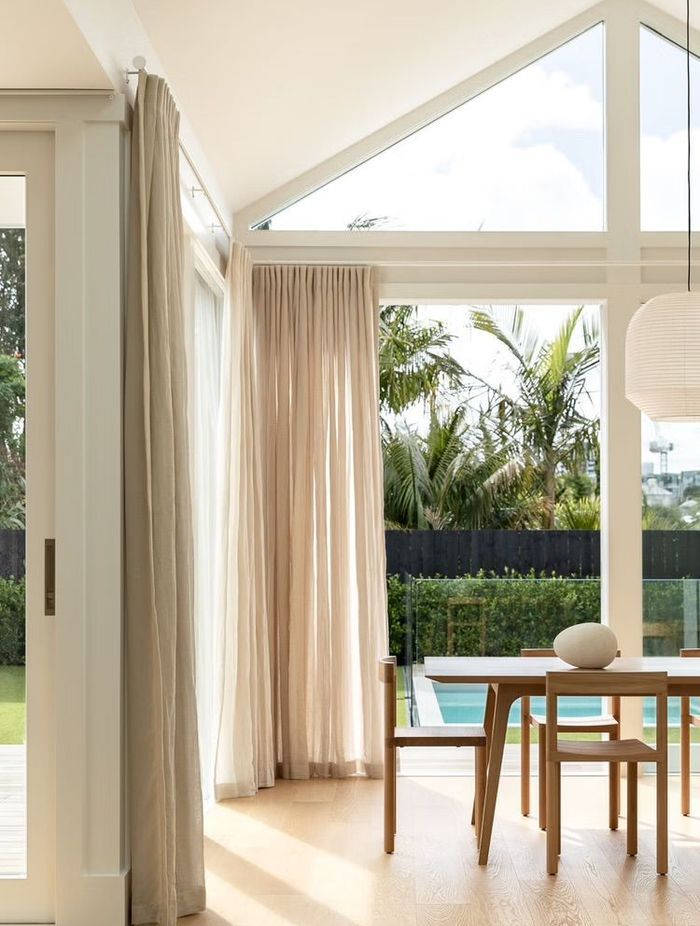 An open-plan living space was added in the renovation of 10 Dickens Street, with large glass doors to the backyard.