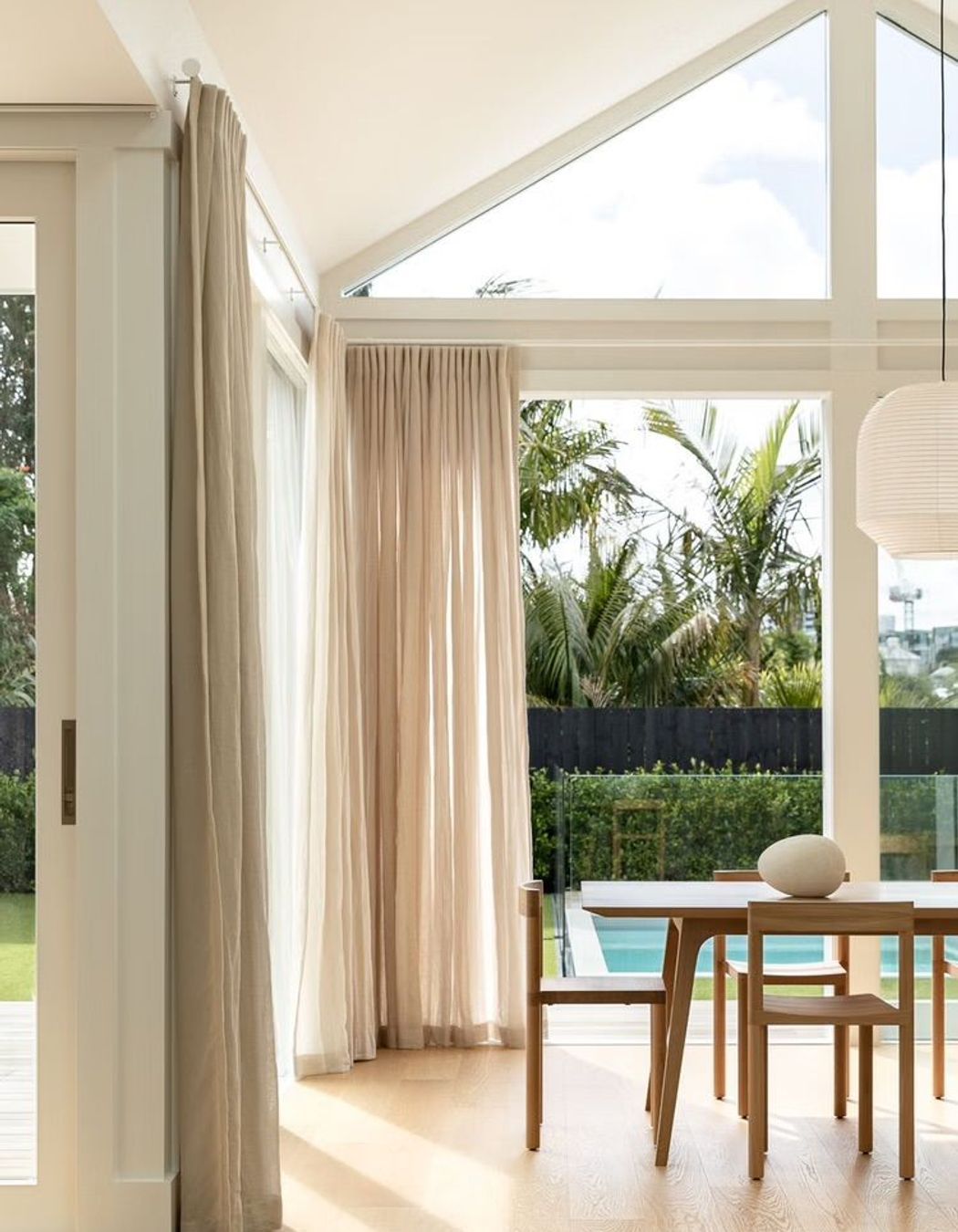 An open-plan living space was added in the renovation of 10 Dickens Street, with large glass doors to the backyard.