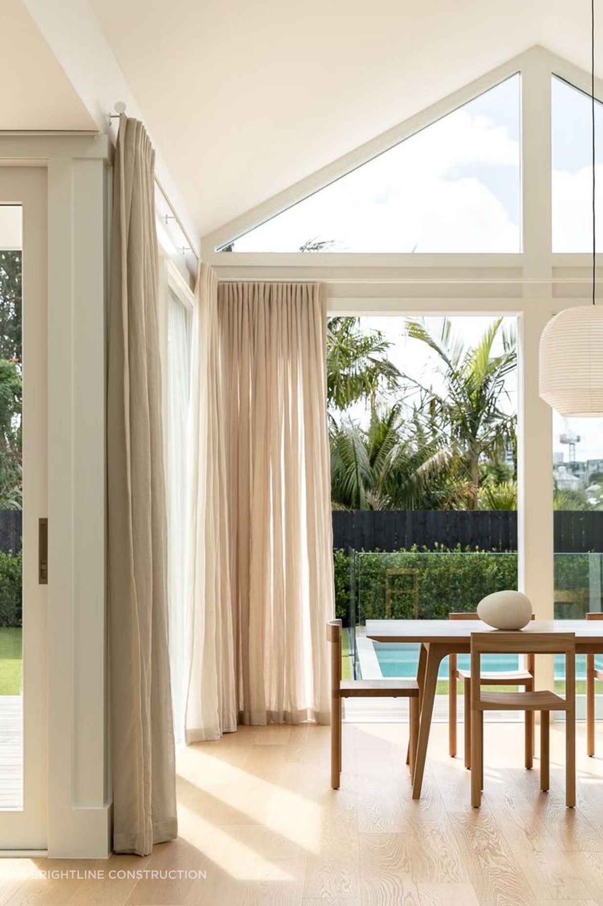 An open-plan living space was added in the renovation of 10 Dickens Street, with large glass doors to the backyard.