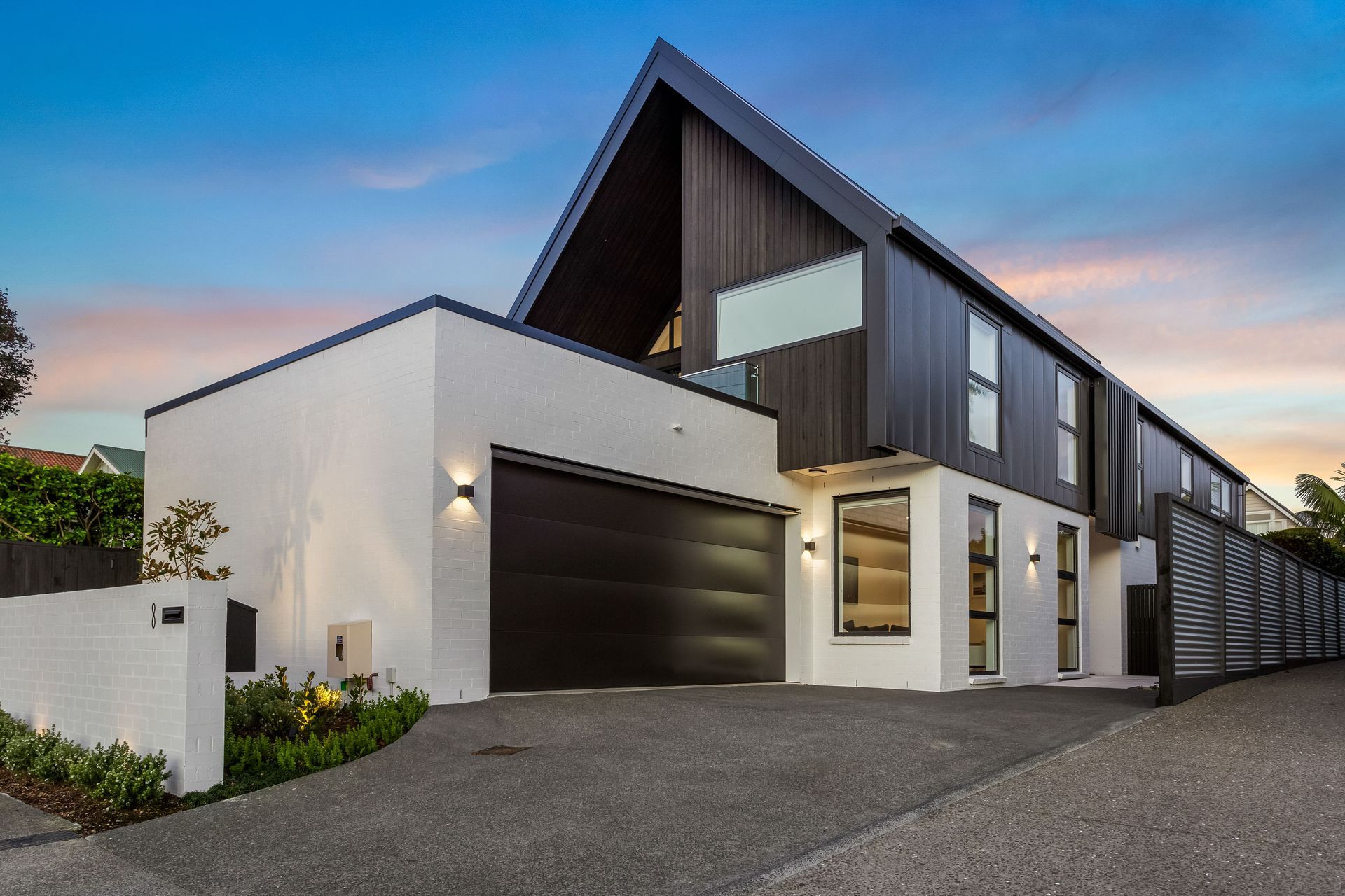 The home's steep gable form is pushed to the absolute limits of what was possible, and allows the spacious floorplan the client desired.