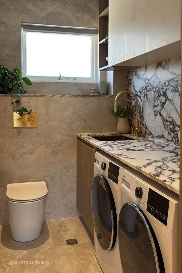 The stone has been used throughout the apartment, continuing the aesthetic.