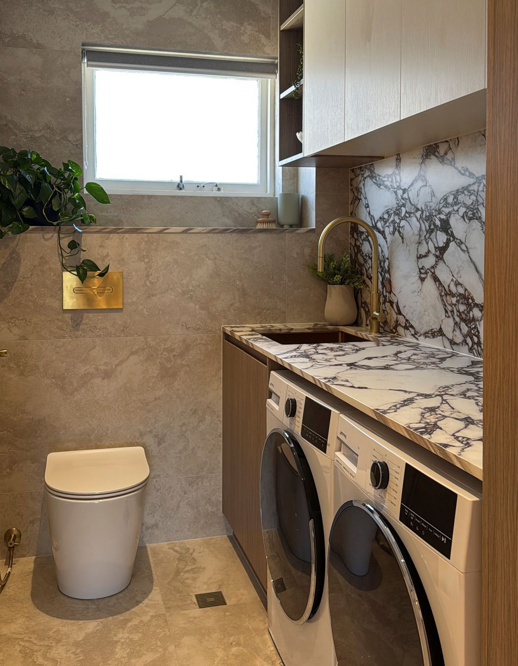 The stone has been used throughout the apartment, continuing the aesthetic.