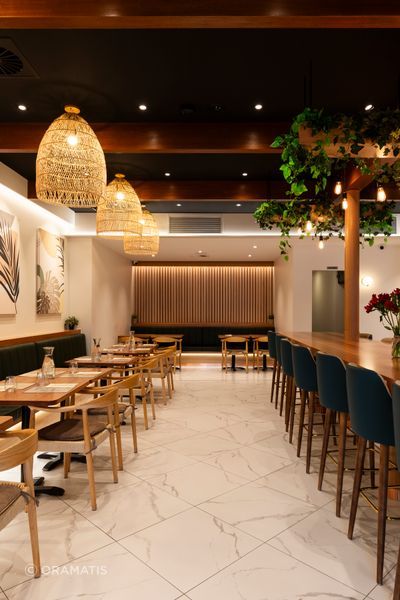 The open-plan dining area includes a variety of different seating styles to give patrons options.