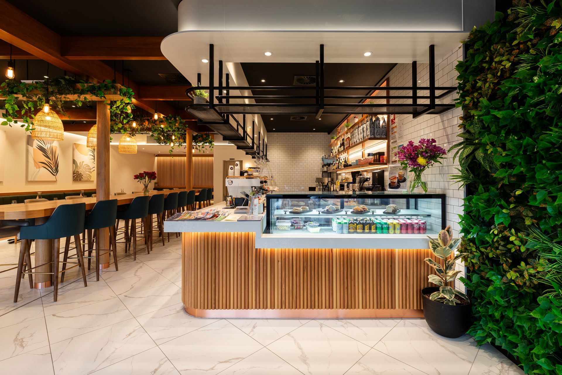 A photograph of the completed cafe entrance — note the similarity to the render!