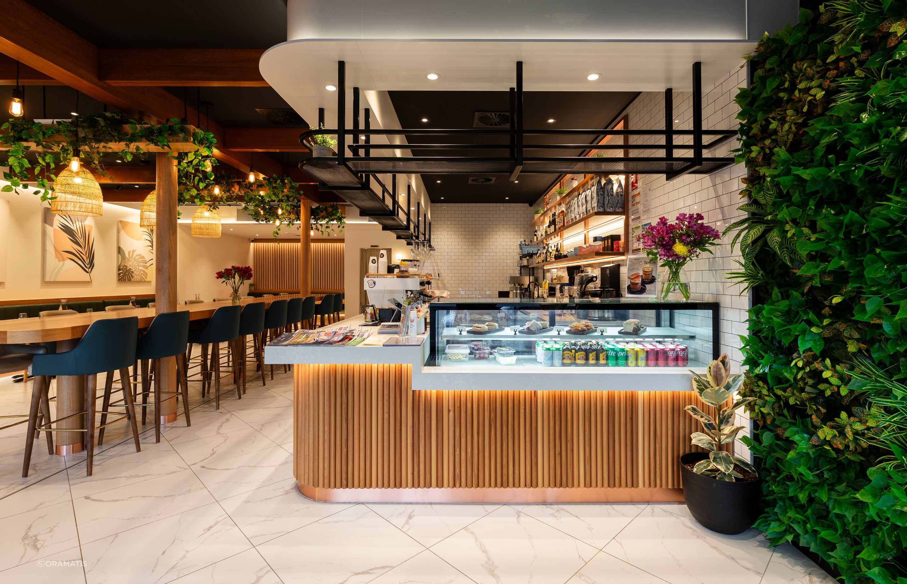 A photograph of the completed cafe entrance — note the similarity to the render!