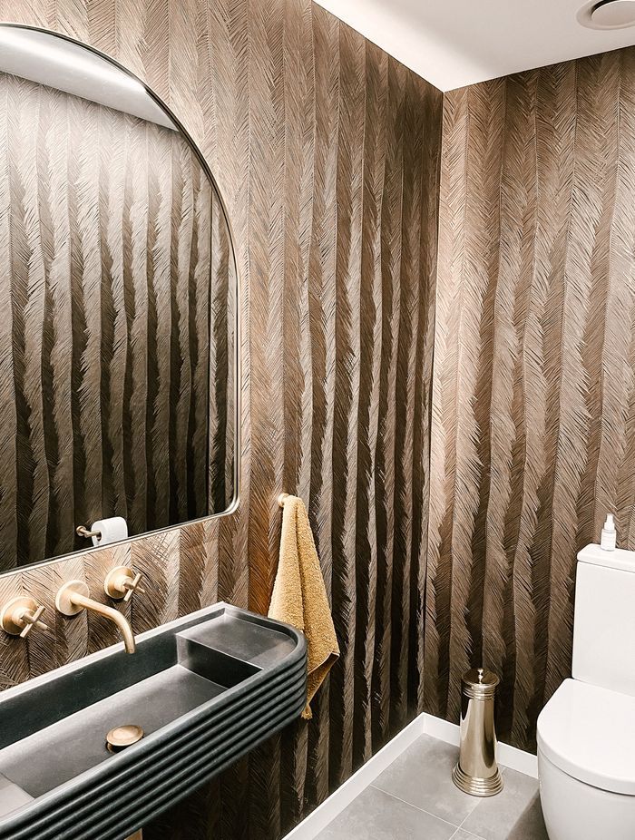 “I feel like it definitely makes a statement but it doesn't feel too overpowering,” says Candice Van Dyk of Mooi Design of this powder room in a Mosgiel house.