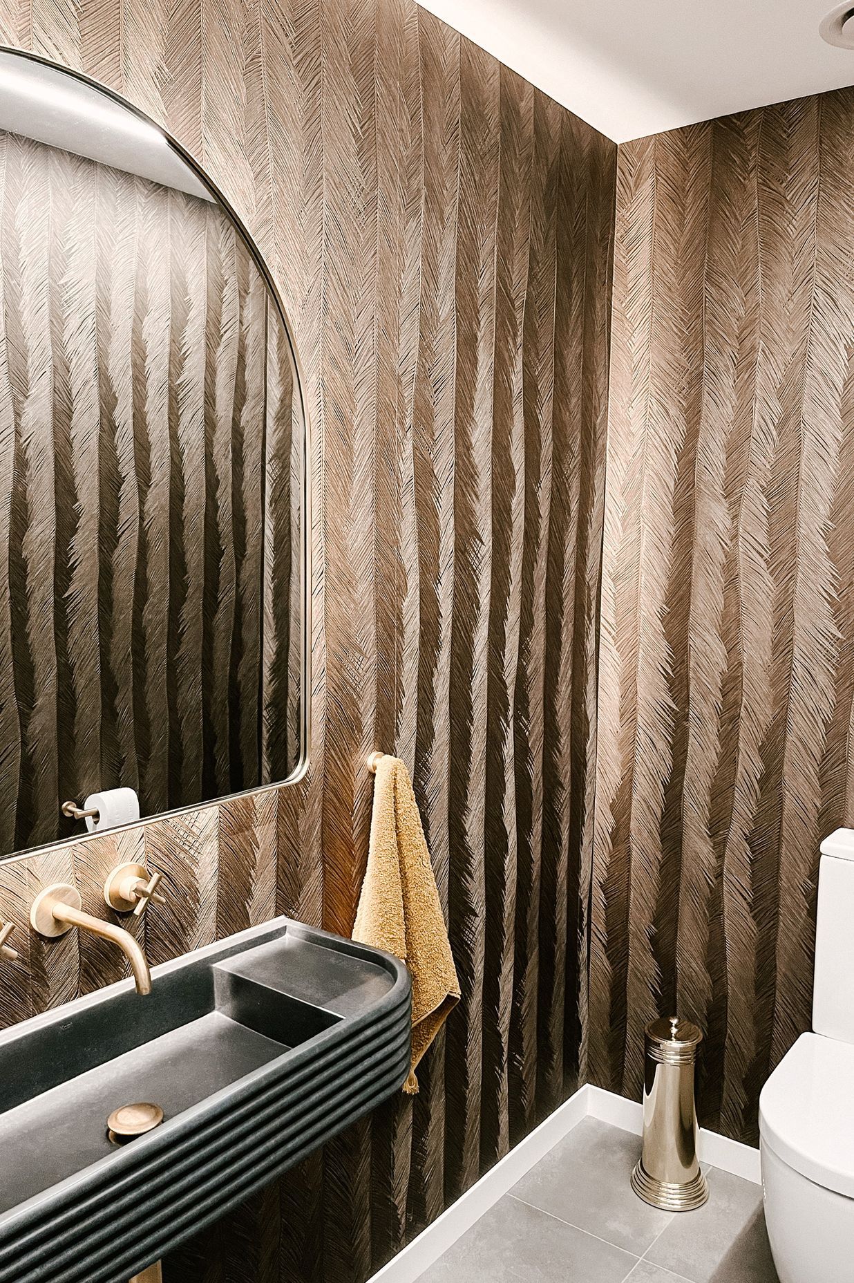 “I feel like it definitely makes a statement but it doesn't feel too overpowering,” says Candice Van Dyk of Mooi Design of this powder room in a Mosgiel house.