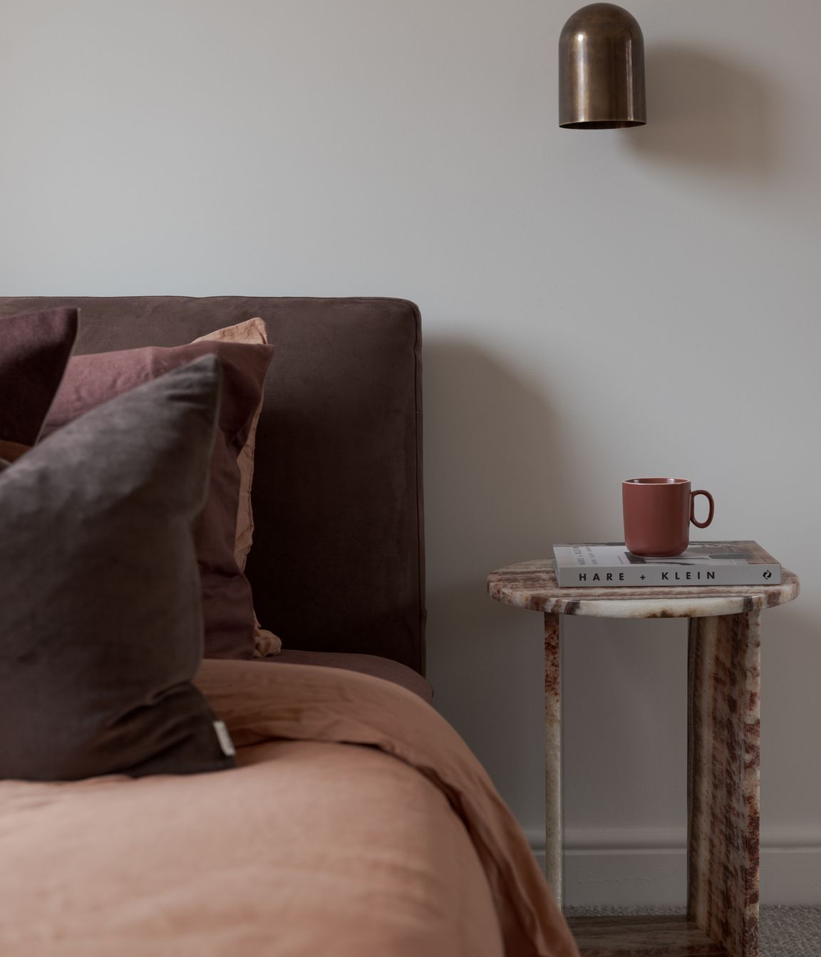 Inspired by the terracotta tiles, a material commonly used in mid-century design, the pair developed a mood board featuring bold accent colours of red, olive, and yellow alongside organic shapes and textures.