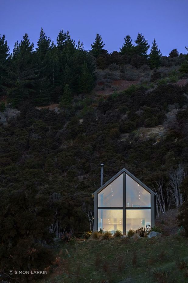 The site is a clearing amongst dense forest.