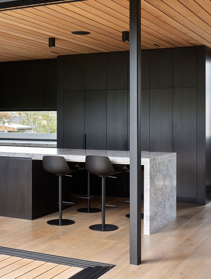 “We worked heavily around the detailing of the expressed negative cedar ceiling on plywood throughout,” says Clint.